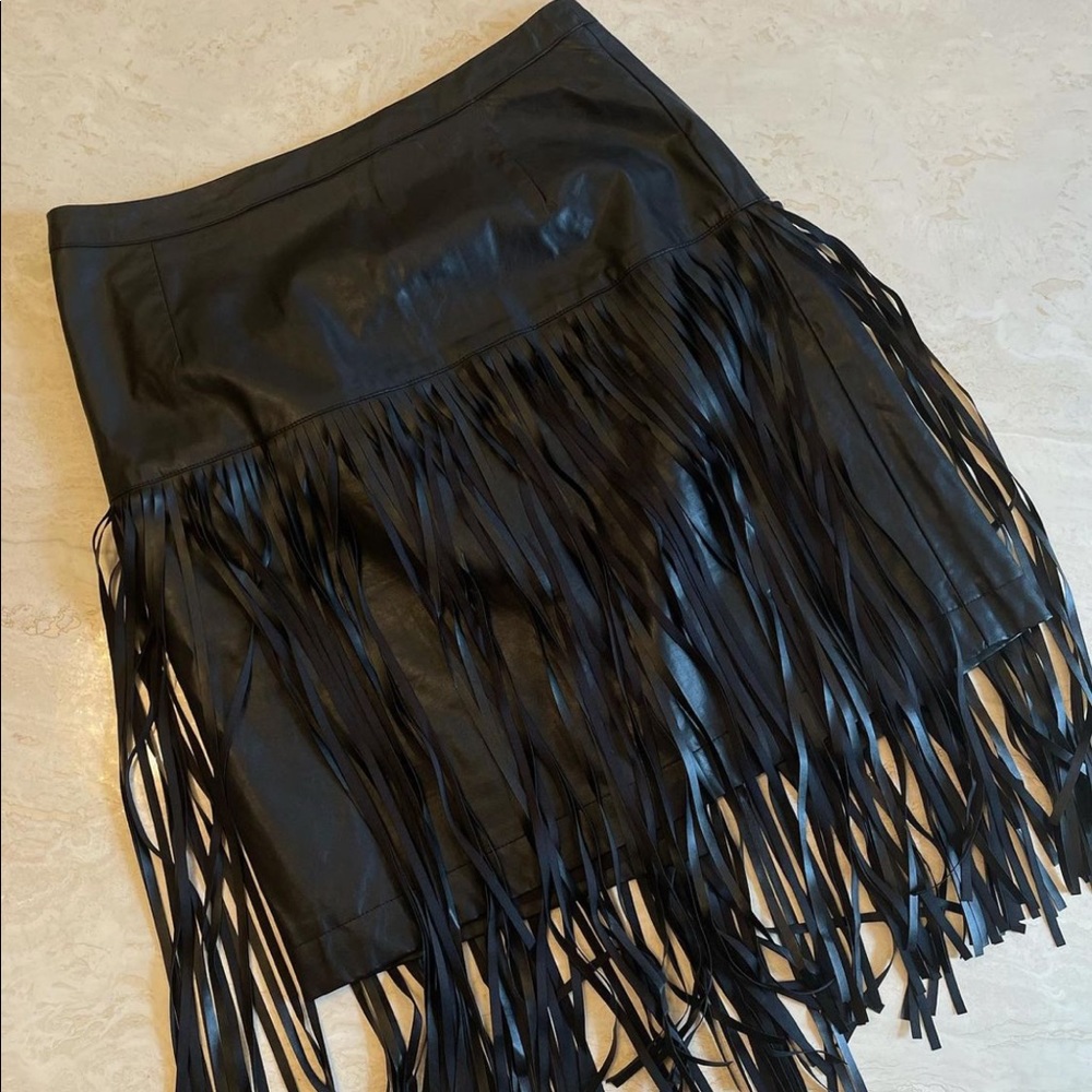 Black fringed faux leather skirt. Gently worn.